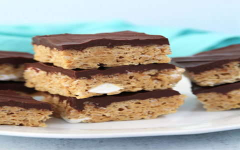 chocolate-topped rice crispy bars with peanut butter
