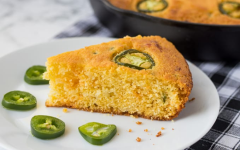 crispy jalapeno cornbread baked in a cast iron pan