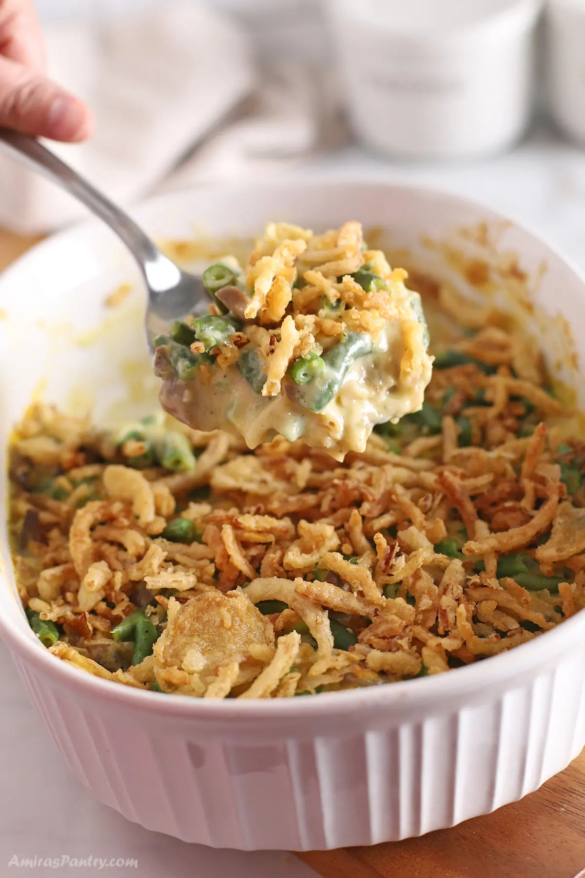 is it possible to add cream of chicken to green bean casserole