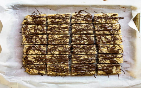 crispy rice treats layered with chocolate and peanut butter