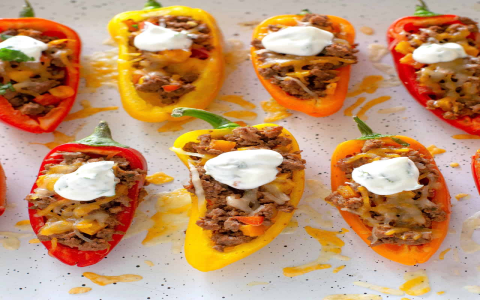 stuffed bell peppers in tomato sauce recipe (Homemade Goodness in Every Bite)
