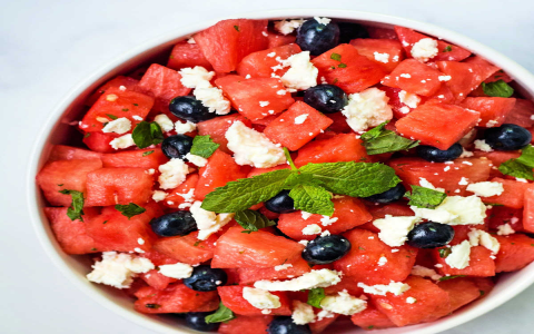 salad with spinach, feta cheese, and watermelon