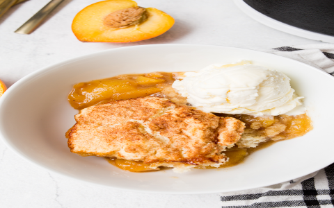 How to Make Dutch Oven Peach Cobbler with Cake Mix | The Easiest Dessert Ever