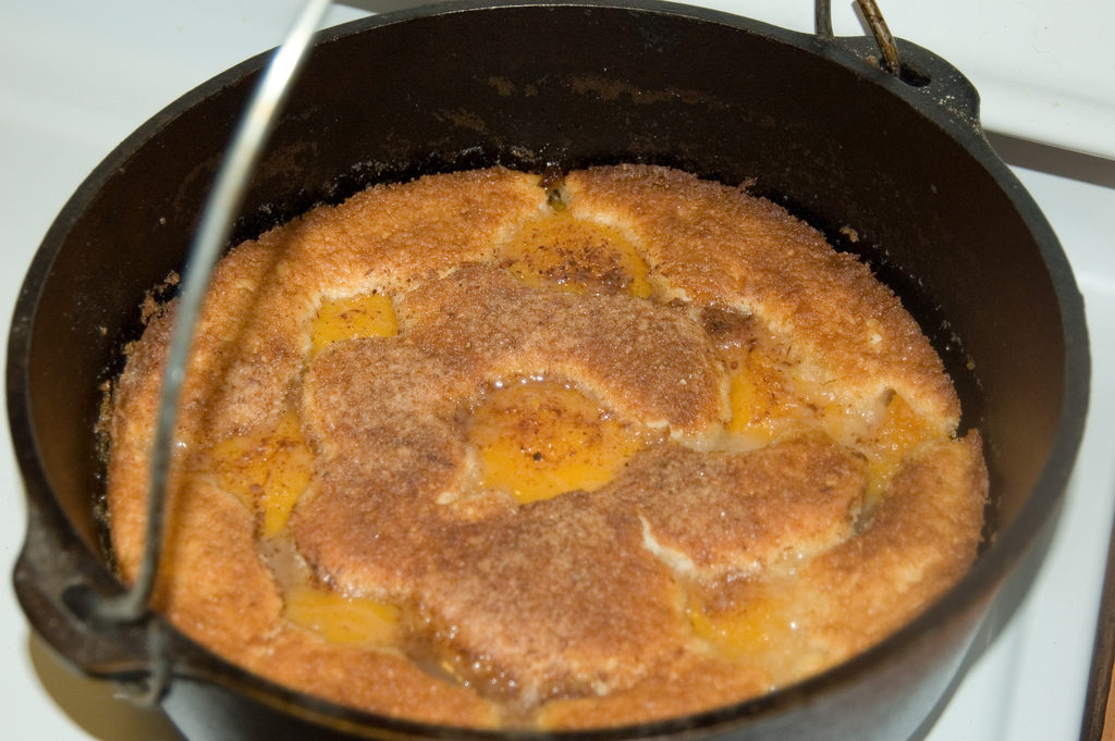 How to Make Dutch Oven Peach Cobbler with Cake Mix | The Easiest Dessert Ever