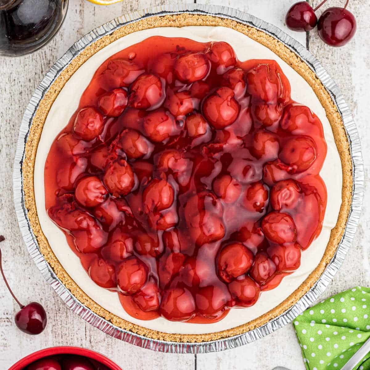 sweet cherry filling atop graham cracker base