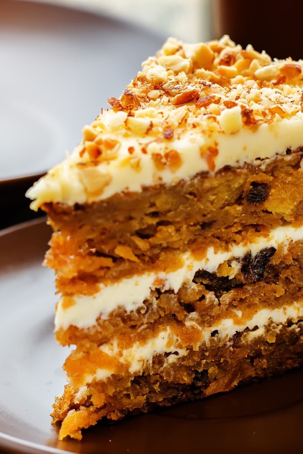 carrot cake by paula deen topped with cream cheese frosting