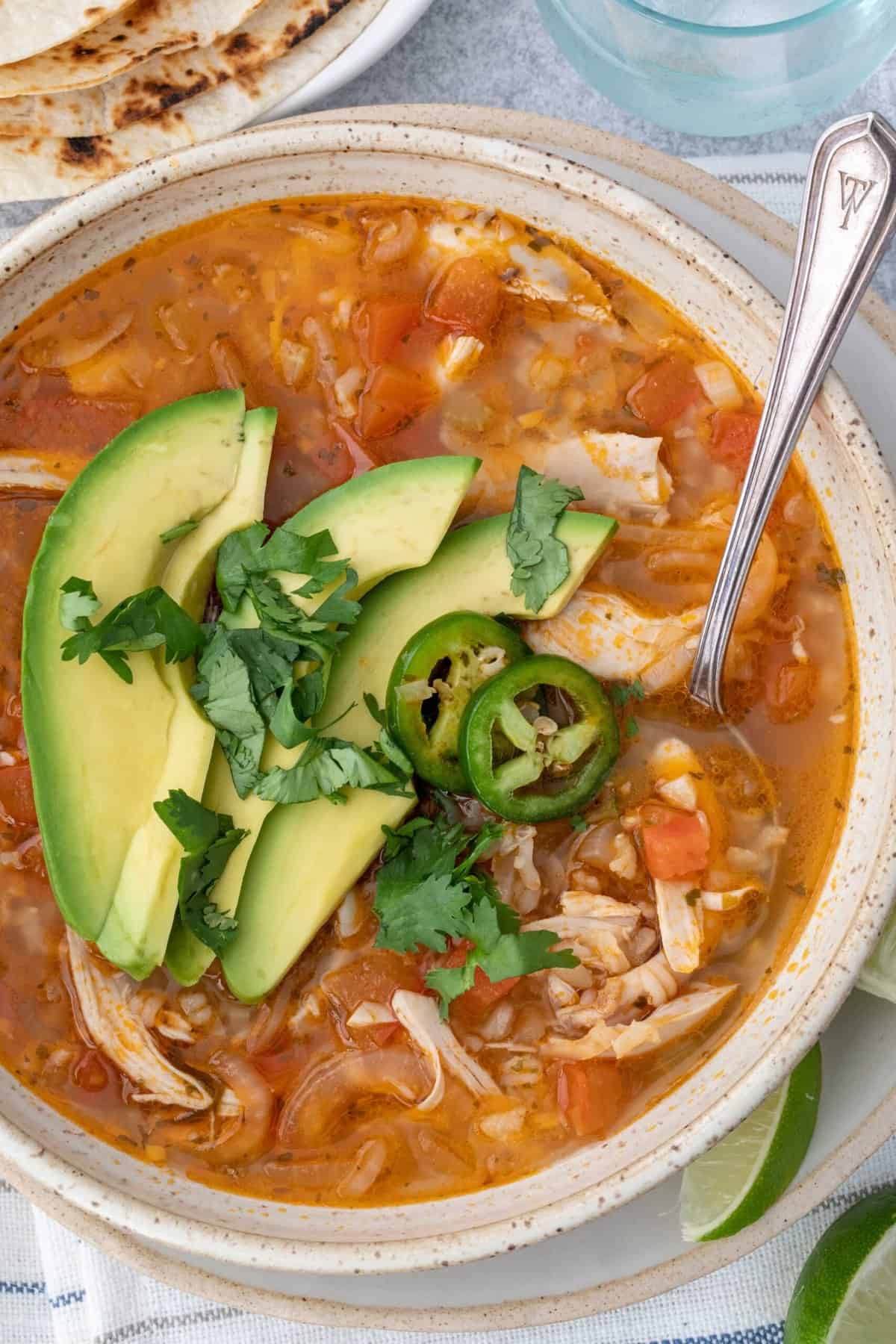 chicken and rice soup with avocado in mexican style