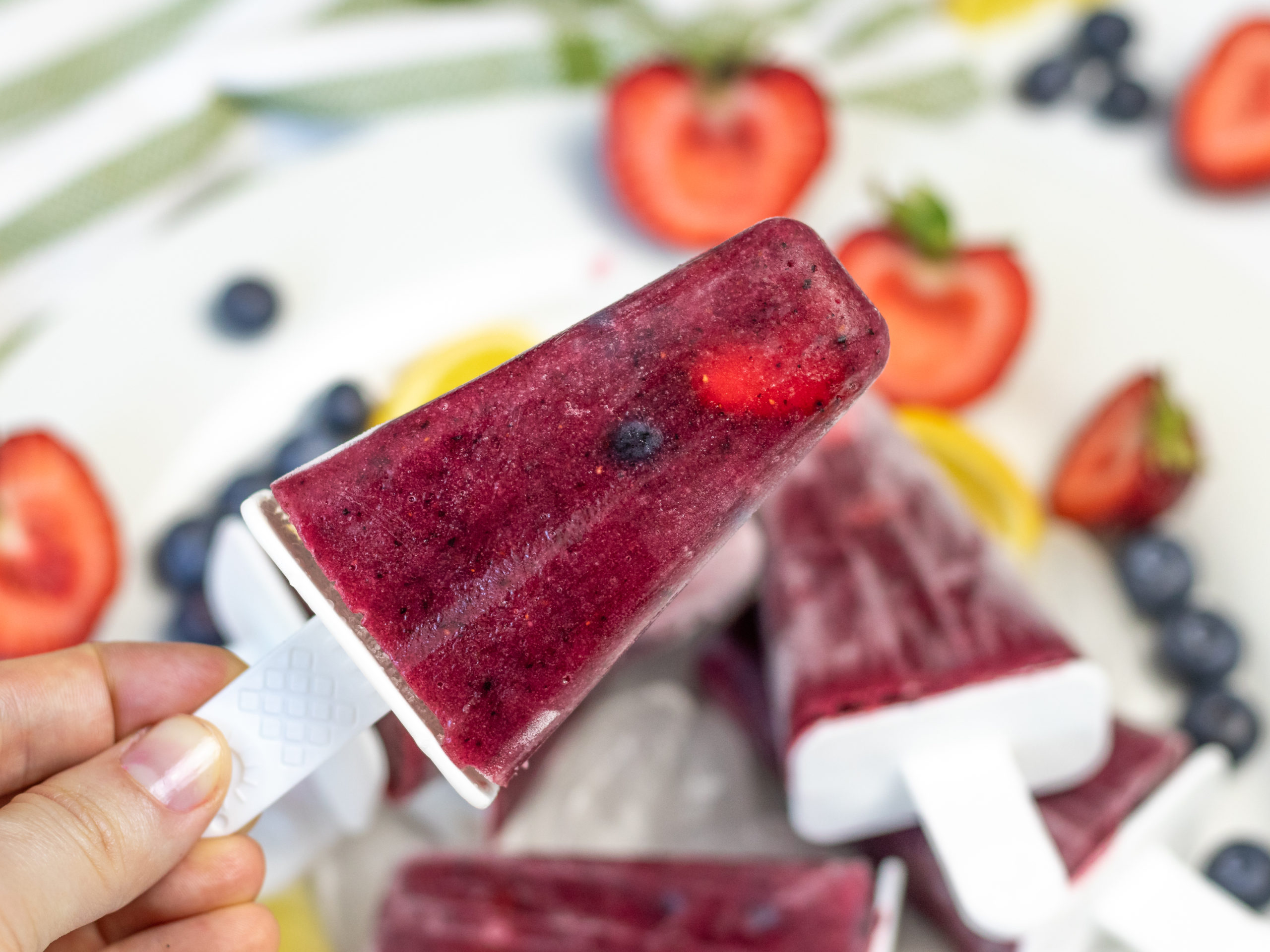 Strawberry Blueberry on Popsicle Stick: The Ultimate Frozen Treat for a Hot Summer Day!