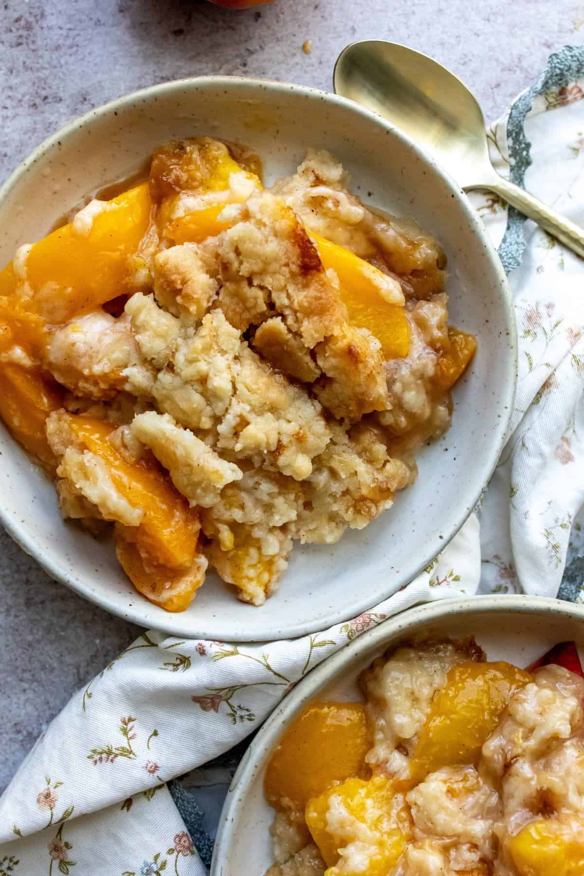 Quick recipe for peach cobbler using a cake mix perfect for busy weeknights