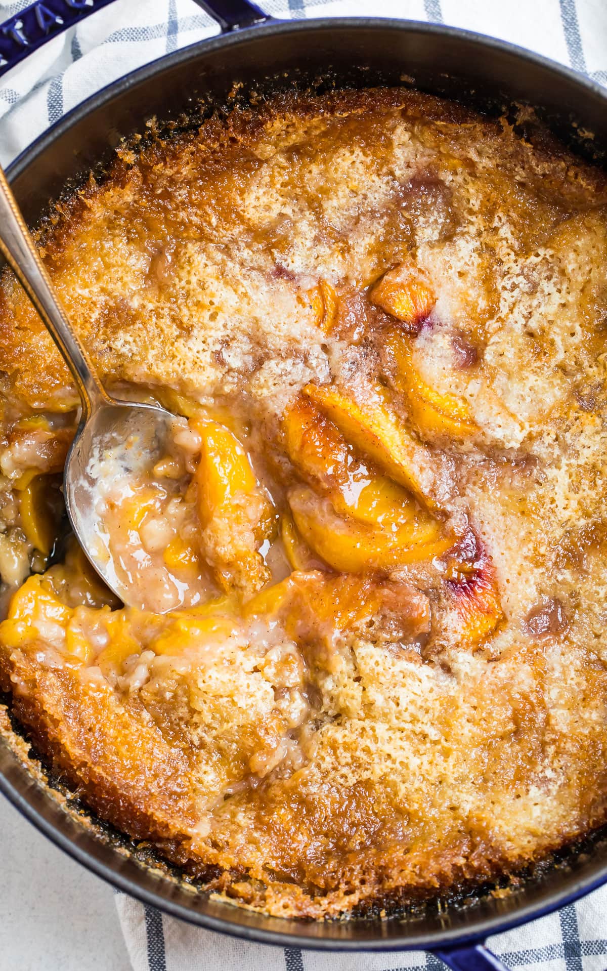Make Peach Cobbler in a Dutch Oven using Sprite? Yes! Its the Super Easy Secret.